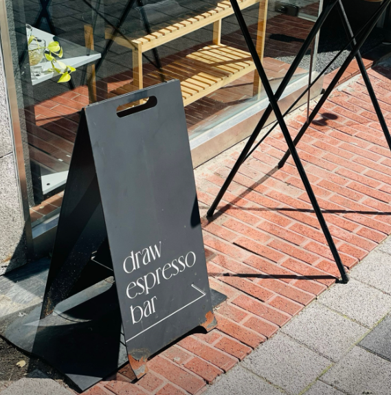The modern interior of DRAW ESPRESSO BAR in Seoul with its signature Lieto coffee.
