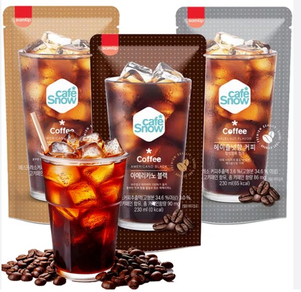 A variety of colorful drink pouches and a cup of ice, a unique Korean convenience store experience.