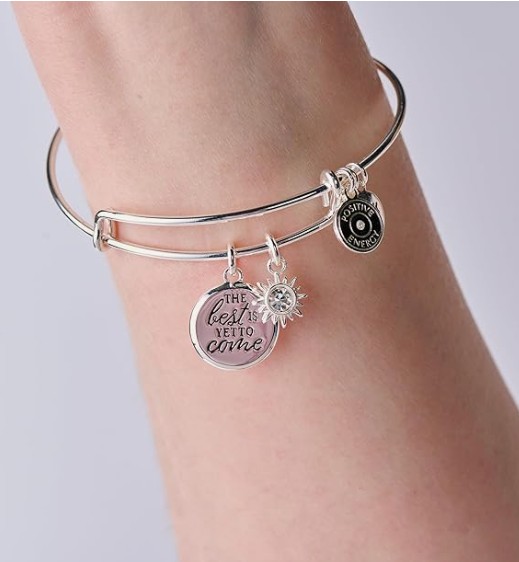 The Alex and Ani Sterling Silver Layered Bangle Bracelet, representing the Huntrix silver chain accessory style.