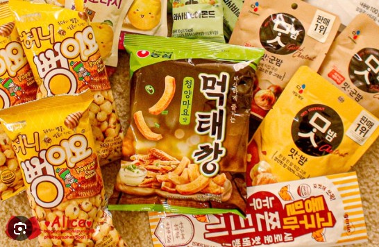 A variety of unique Korean snacks like Turtle Chips and Pepero, a delicious Korean souvenir.