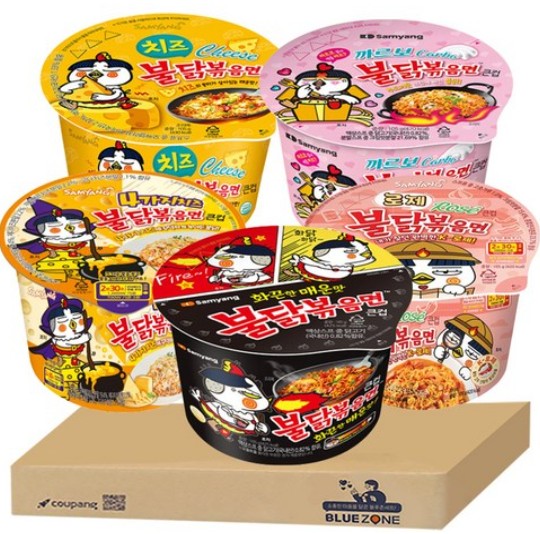 A package of Buldak Spicy Noodles and an instant Tteokbokki kit, a popular K-Food souvenir.