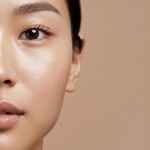A close-up of a model's smooth, poreless-looking skin, demonstrating the goal of the K-Beauty guide on how to minimize pores.